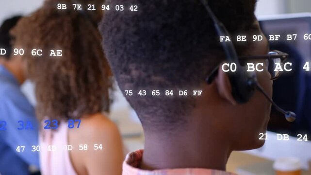 Agent speaking into headset typing for support, camera panning hex overlay across screens and faces