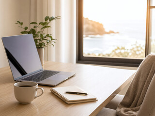 Fototapeta premium Laptop workspace by window with ocean view and warm natural sunlight