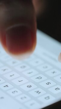 Female hands typing text on smartphone close-up.