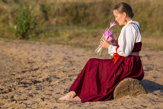 a woman in national Russian clothing