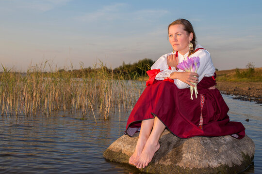 a woman in national Russian clothing