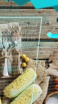 Vertical video: Teal column appearing overlays sweeping and settling over corn, forks showing data