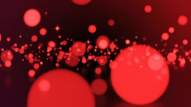 Vibrant red bubbles floating in darkness.