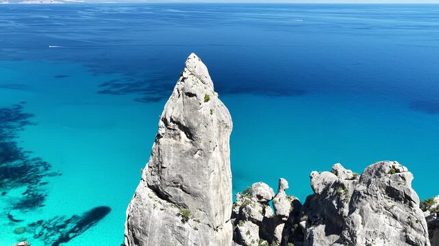 Aerial view of Cala Goloritz&egrave;, Baunei Coast, Sardinia, Italy. Iconic turquoise waters, white limestone cliffs adn pristine beach, often ranked among the most beautiful beaches in the world
