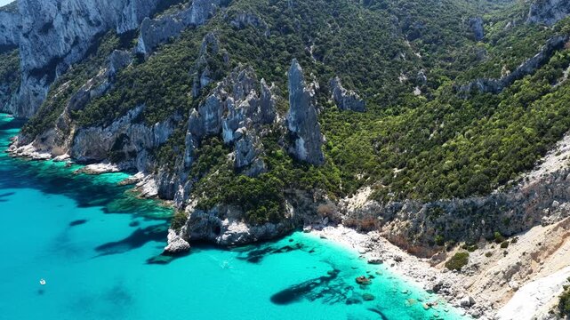 Aerial view of Cala Goloritz&egrave;, Baunei Coast, Sardinia, Italy. Iconic turquoise waters, white limestone cliffs adn pristine beach, often ranked among the most beautiful beaches in the world
