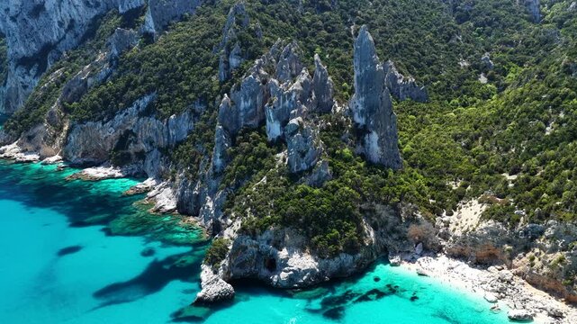 Aerial view of Cala Goloritz&egrave;, Baunei Coast, Sardinia, Italy. Iconic turquoise waters, white limestone cliffs adn pristine beach, often ranked among the most beautiful beaches in the world