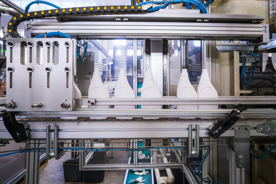 The production process of plastic spray bottles intended for household chemicals.