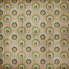 Fototapeta premium Retro concentric circle pattern on textured kraft background, earthy tones with blue and green rings, perfect for vintage design, wallpaper, and creative projects.