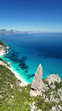 Aerial view of Cala Goloritz&egrave;, Baunei Coast, Sardinia, Italy. Iconic turquoise waters, white limestone cliffs adn pristine beach, often ranked among the most beautiful beaches in the world