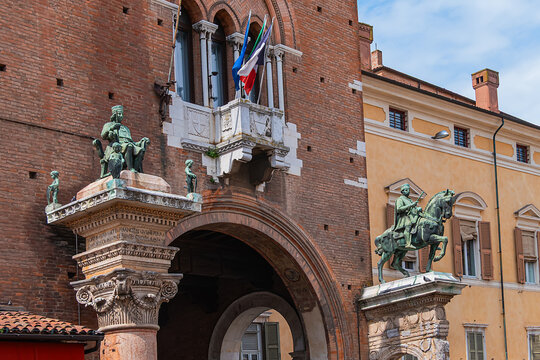 Municipal Palace, with its statues: a seated figure of Duke Borso d'Este and Marquis Niccolo III d'Este equestrian statue, was Este Ducal residence (Now is Town Hall). Ferrara, Italy.