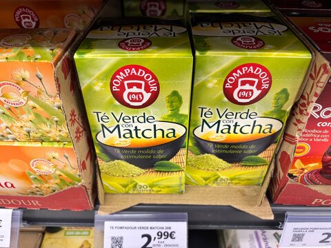 Alicante, Spain - April 25, 2026: Pompadour green tea with matcha packaging displayed on a supermarket shelf, featuring vibrant colors and clear branding