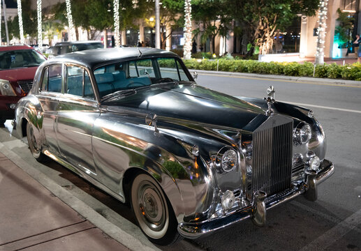 Miami, Florida, USA - January 26, 2025: Luxury retro car Rolls Royce Silver Cloud. Car Rolls Royce Silver Cloud parked. Silver car, corner view. Rolls Royce Silver Cloud retro car