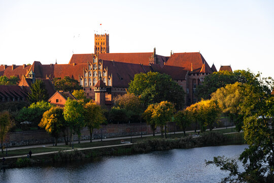 Malbork Castle and the Nogat river in autumn	