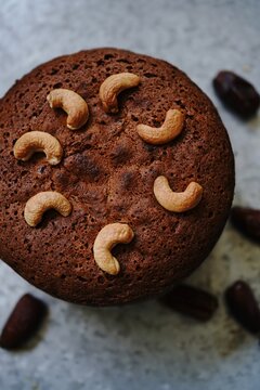 Homemade Dates carrot cake with nuts, selective focus