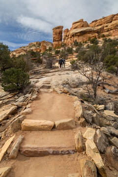 Hikers hiking to the Devils Kitchen in Colorado National Monument Grand Junction