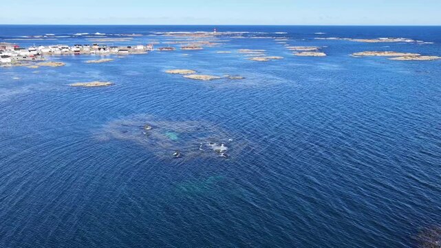 Aerial view of various reefs and islets near the village of Veiholmen in Smoela municipality, Norway.