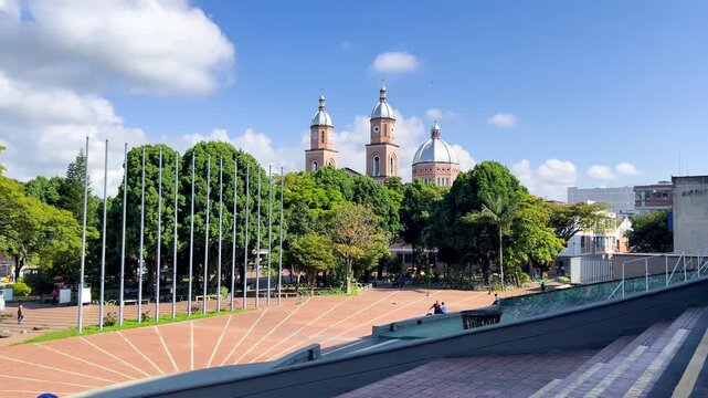 The small square in front of the municipal administrative center, with the Church of St. Francis of Assisi in the background, in the city of Armenia, Quind&iacute;o, Colombia
