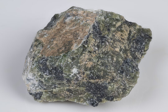 Durable mineral formation. Rough textured aragonite sample described. Sample of rugged aragonite with encrustation. Natural aragonite nodule showcasing rough surface features