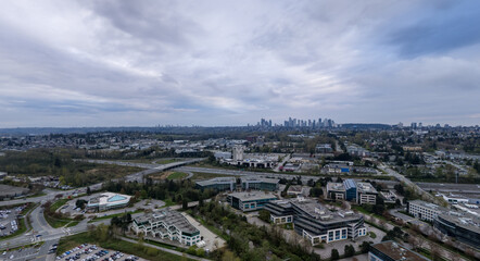 Fototapeta premium Aerial View Of Burnaby Skyline And Suburban Business Districts In Greater Vancouver, British Columbia, Canada