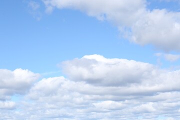 Obraz premium Picturesque blue sky with white clouds on sunny day