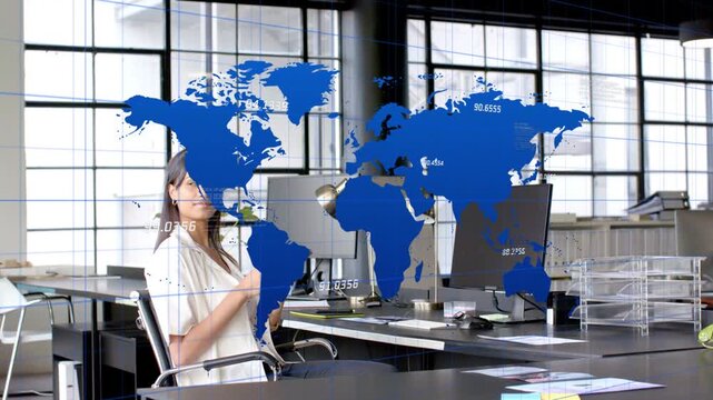 Woman tapping touchscreen, activating animated world map overlay showing labels for business data
