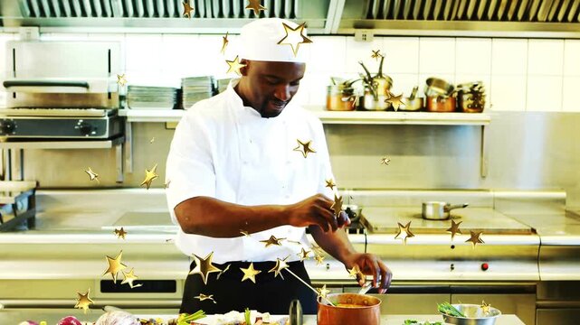 In kitchen chef chopping lifting pot stirring tasting for plating gold stars drifting in foreground