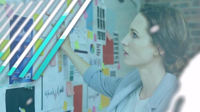 Woman turning toward board, moving sticky notes and project planning with overlays passing over her