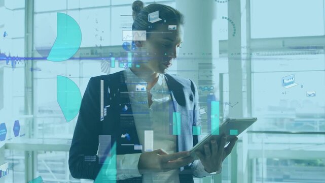 Woman in atrium looking at tablet, tapping and navigating business data, floating charts updating