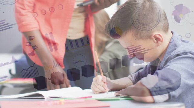 Boy writing in classroom, teacher entering from left checking work, charts highlighting notebook