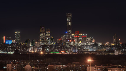 Fototapeta premium The Beijing China Zun landmark complex under the night sky