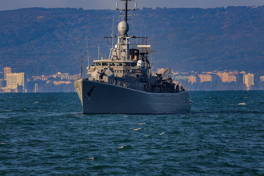 Navy frigate sail on the smooth sea during mission of protect and rescue in sea.