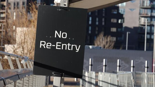 No re entry sign on outdoor event venue, forbidden entrance