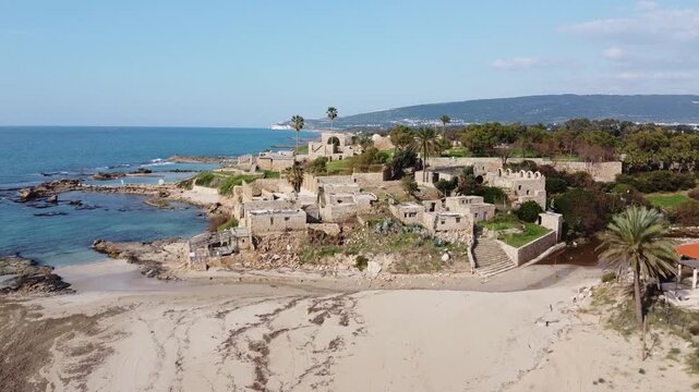 Aerial Rising Drone Shot of Achziv National Park Coastal Ruins, Israel