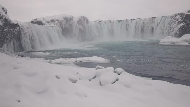 Go&eth;afoss Waterfall, a spectacular waterfall plunging over a curved in Fossholl, the north of Iceland