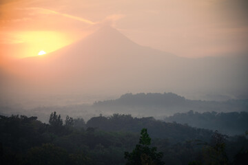 Fototapeta premium View Mount Merapi and Borobudur from Puthuk Setumbu, Java, Indonesia