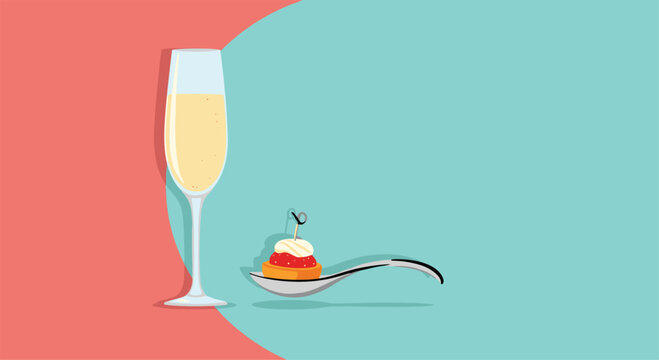 Elegant presentation of a flute of champagne next to a gourmet appetizer served on a silver spoon over a two tone background.
