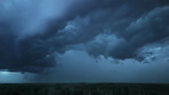 Aerial Panning Epic Thunder Storm with Lightning Strikes and Dramatic Dark Clouds over Landscape