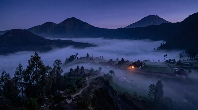 Majestic misty mountain village at dawn under purple sky for travel concept