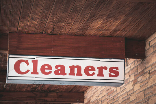 Dry cleaners sign on building