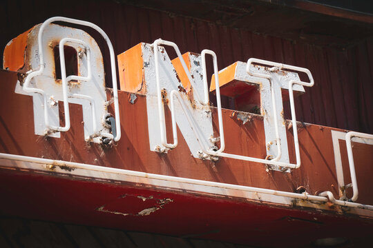 Old retro vintage neon letter sign