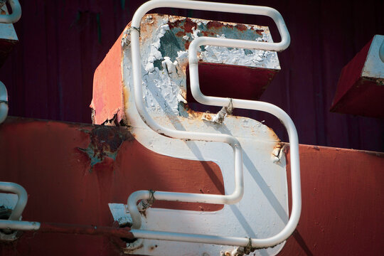 Old retro vintage neon letter sign