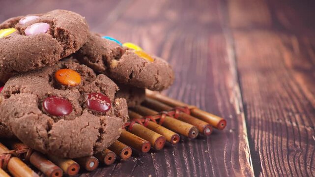 Baking chocolate cookies with colorful candy pieces