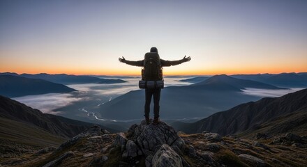 Obraz premium Majestic Silhouette of Adventurer at Sunrise Over Mountain Range