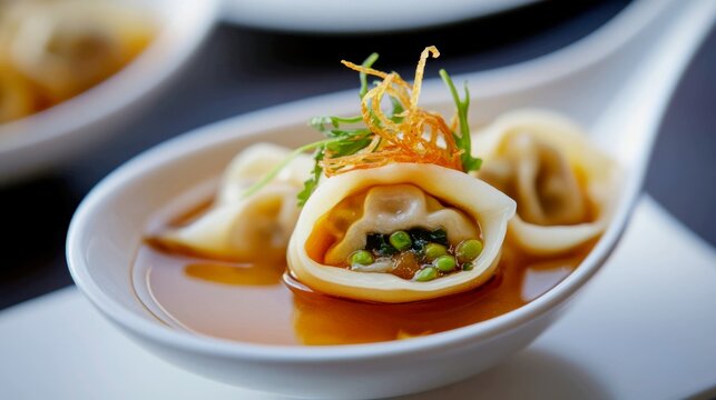A single raviolo sits in a spoon, like a wonton in soup. But the filling is a classic Italian combination (like osso buco)