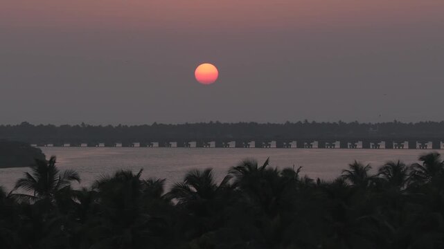 Aerial drone shot of sunset over river in Honnavar Karnataka India