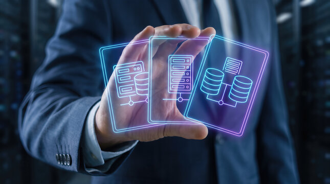 Businessman holding glowing digital server and database in datacenter environment. Cloud computing infrastructure management hosting and enterprise it technology solution for business