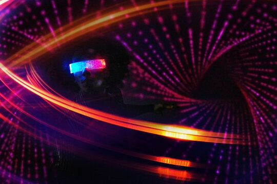 Dancing in cyberspace with virtual reality headset at night