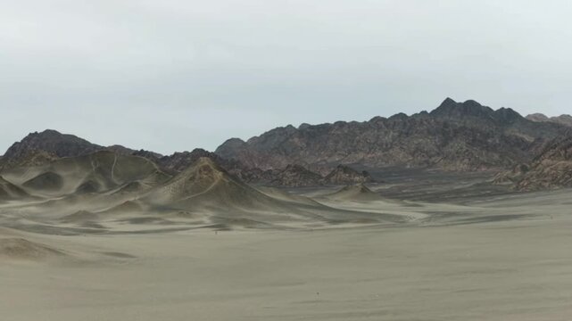 Cinematic view of the desolate black mountains in Hei Du Shan Mangya China resembling a landscape from another planet.