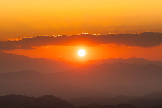 misty sunset in the mountains