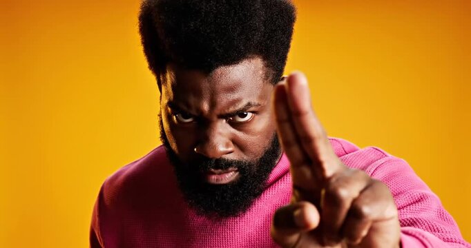 Man Gesturing with Middle Finger Raised.